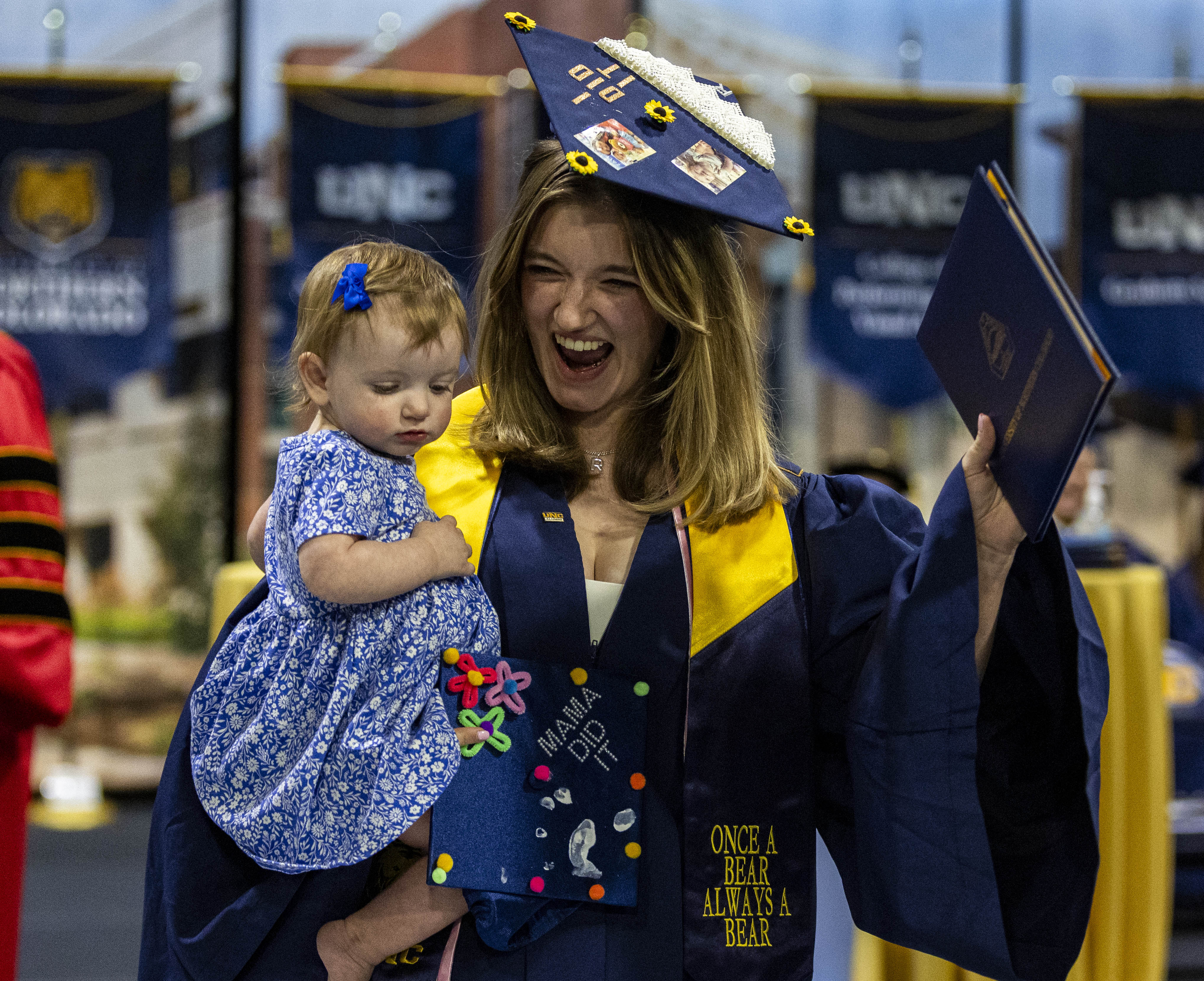 University of Northern Colorado graduate Stella Bollefer celebrates with her...
